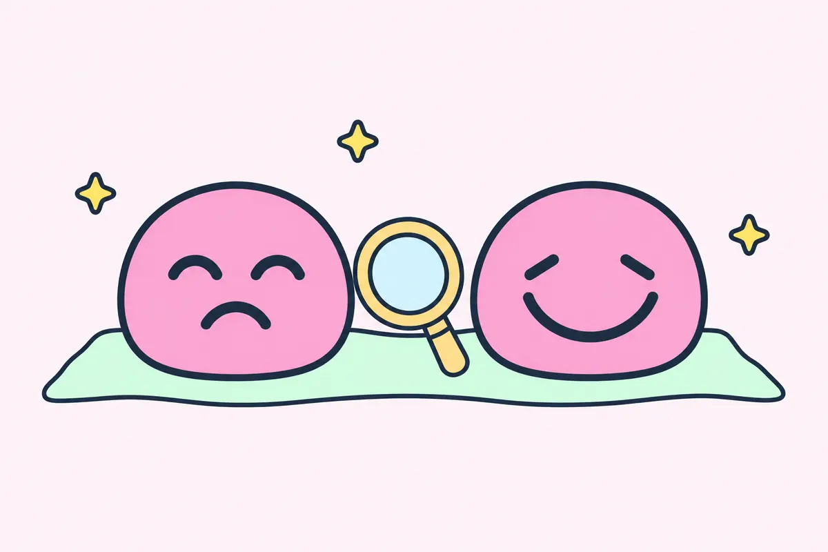 Two round pink mochi: the left one has curved, smiling eyes and a downturned mouth; the right one has drooping eyes and a wide smile.